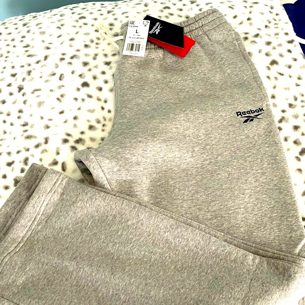 Brand new Reebok gray sweatpants with original tags. Size large